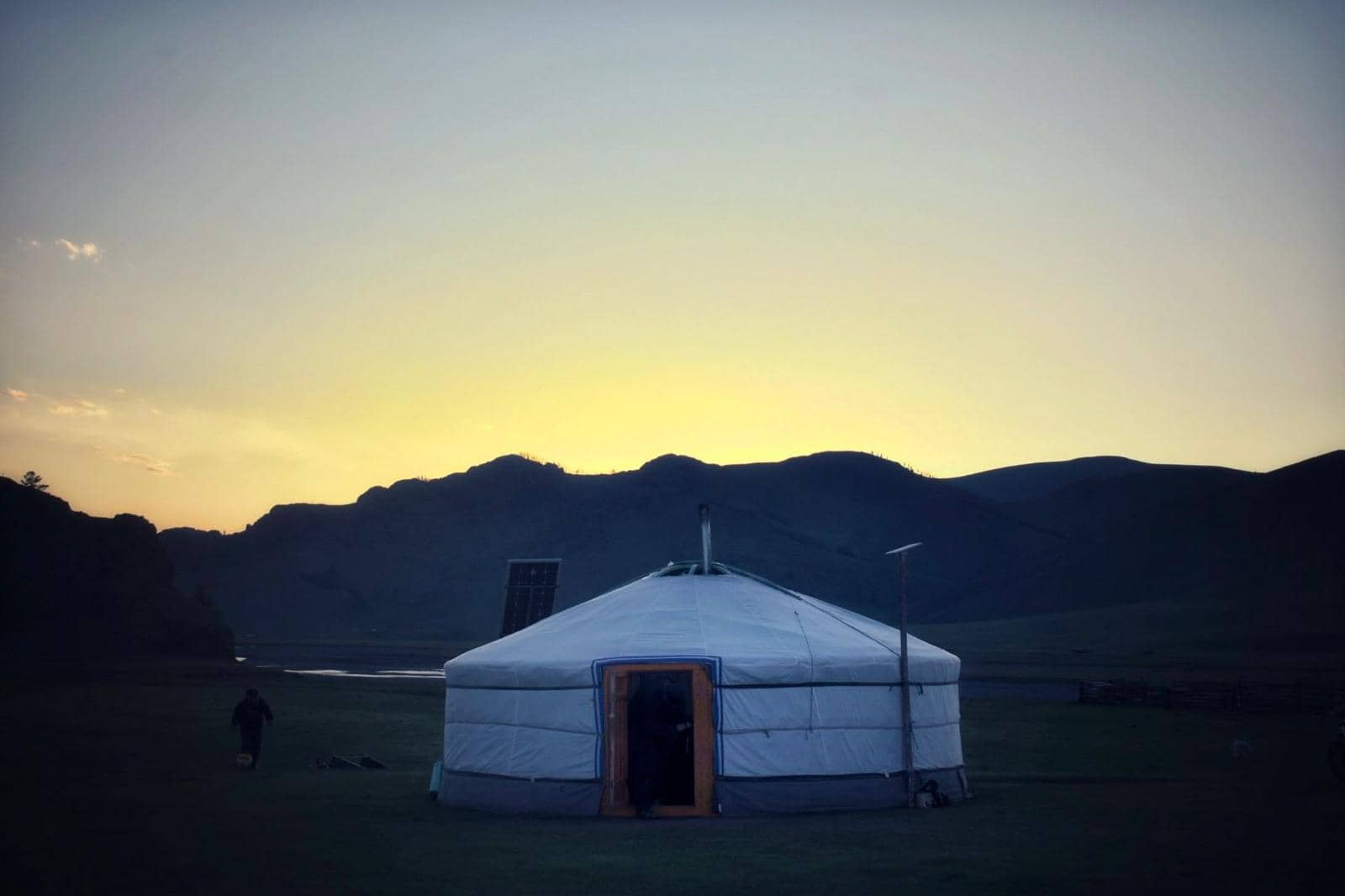 Ger at blue hour beneath the mountains